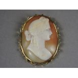 A 14k gold cameo brooch/pendant