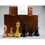 A weighted 20th century Staunton chess set complete with rules and mahogany box (A/F slight chip to