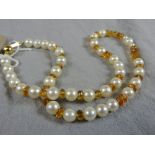 A pearl and citrine necklace length 40cm