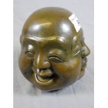 A bronzed four faced Buddha