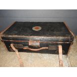 A vintage/early 20th leather and black canvas trunk by cane with target motif and brown leather