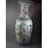 A Qing dynasty vase decorated with precious objects 60cm high
