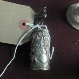 Withdrawn - An early 20th Century Chinese silver candle snuffer with dragon detail,