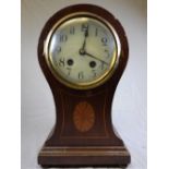 An early 20th Edwardian in laid  mahogany balloon shaped mantel clock fitted with enamel dial