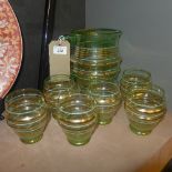 A 1970s lemonade set, having a green and gilt jug and six similar glasses (7)