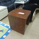 A contemporary leather stool H46 x W42cm