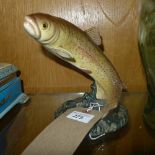 A Beswick style trout on naturalistic setting