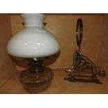 An early 20th century Edwardian brass and glass paraffin wall lantern with rare glass defector and
