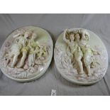 A pair of Meissen style plaques of children and cherubs - 34cm x 27cm