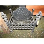 A collection of cast iron fire grates.