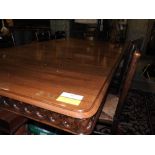A large Gothic Revival walnut dining/boardroom table the rectangular moulded top with tracery