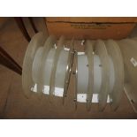 A pair of Art Deco style opaque four tiered wall lights