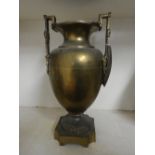 A classical style twin handled brass urn - Height 37cm