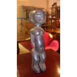 An African Tribal Art carved figure toge