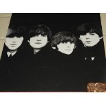 A large contemporary print on canvas of the Beatles (the Fab Four)