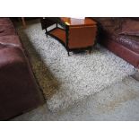 A woollen carpet with ivory ground(280cm x 200cm) a/f