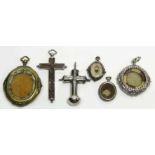 (on 6) SPANISH COLONIAL DEVOTIONAL PENDANTS Mexico, 18th c., a tubular silver cross with cross