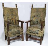 PAIR OF ITALIAN RENAISSANCE WALNUT ARMCHAIRS 17th c., early tapestry to high backs and seats, 58”h