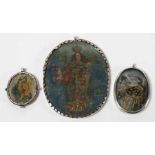 (3) SPANISH COLONIAL DEVOTIONAL PENDANTS all oval, in silver frames, under glass
the largest 18th