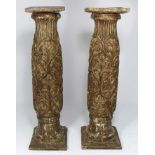 PAIR OF 19TH C. CONTINENTAL CARVED PEDESTALS fluted necks, overall carved and gold painted repeating