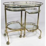 1960’S BRASS AND GLASS DRINKS CART kidney shape, roll out sides, on large casters
31”h; 32.5”w,