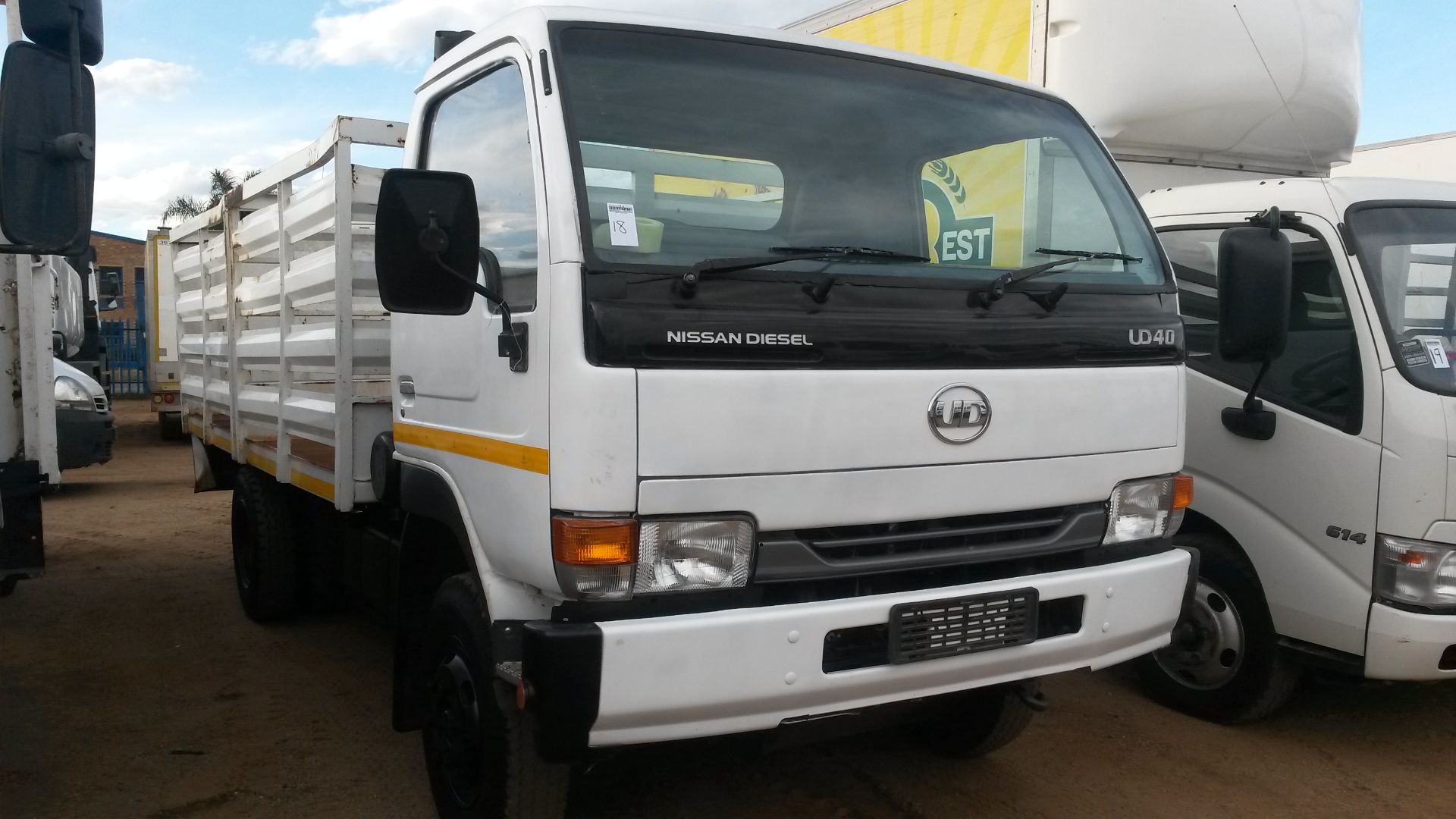 2012 NISSAN UD40 CATTLE BODY - REG NO: HVY904NW