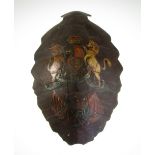 A SHAPED 19TH CENTURY TURTLE SHELL, the outer shell painted with a Royal Coat of Arms and crossed