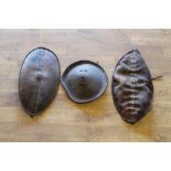 THREE LATE 19TH CENTURY MAASAI AND ETHIOPIAN SHIELDS, comprising a Maasai type shield, oval shaped