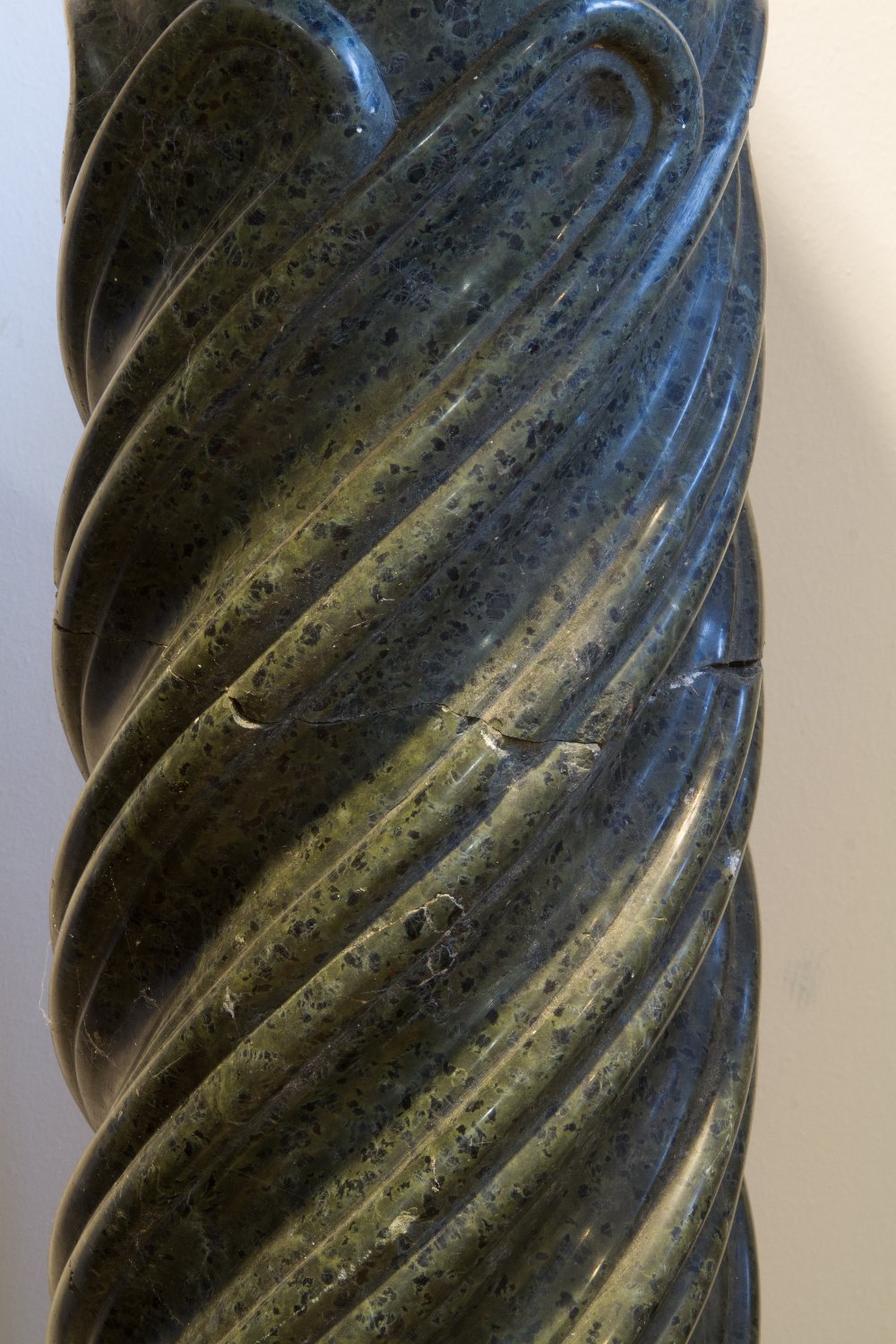 A NEAR PAIR OF 19TH CENTURY DARK GREEN MARBLE COLUMNS, each with a circular stand above twist and - Image 4 of 4