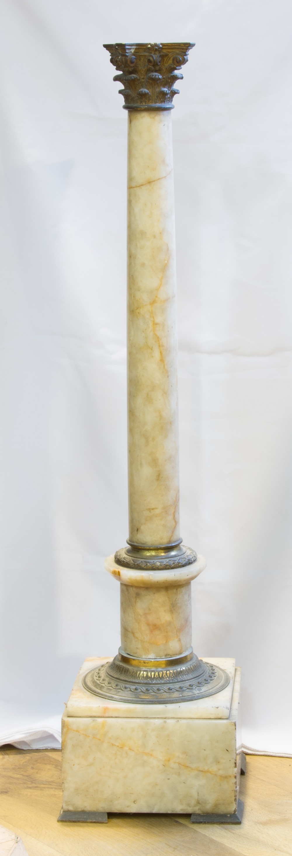 AN EMPIRE STYLE MARBLE COLUMN, with gilt metal bandings, H 100 cm, together with a faux green marble