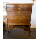 AN EARLY 19TH CENTURY OAK CHEST ON STAND, the upper section with two short above three longer