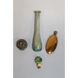 A ROMAN GLASS TEAR FLASK, gilt metal scent bottle, a small glass swirl scent and a white metal