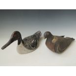 AN EARLY 20TH CENTURY PAINTED CARVED WOOD DECOY DUCK, in naturalistic form and colours, L 33 cm,