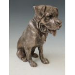 AN EARLY 20TH CENTURY SILVERED METAL MODEL OF A MASTIVE DOG, the dog seated in a realistic pose with
