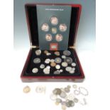 A COIN COLLECTION CONTAINED IN A FITTED CASE, to include modern gold commemorative issues, British