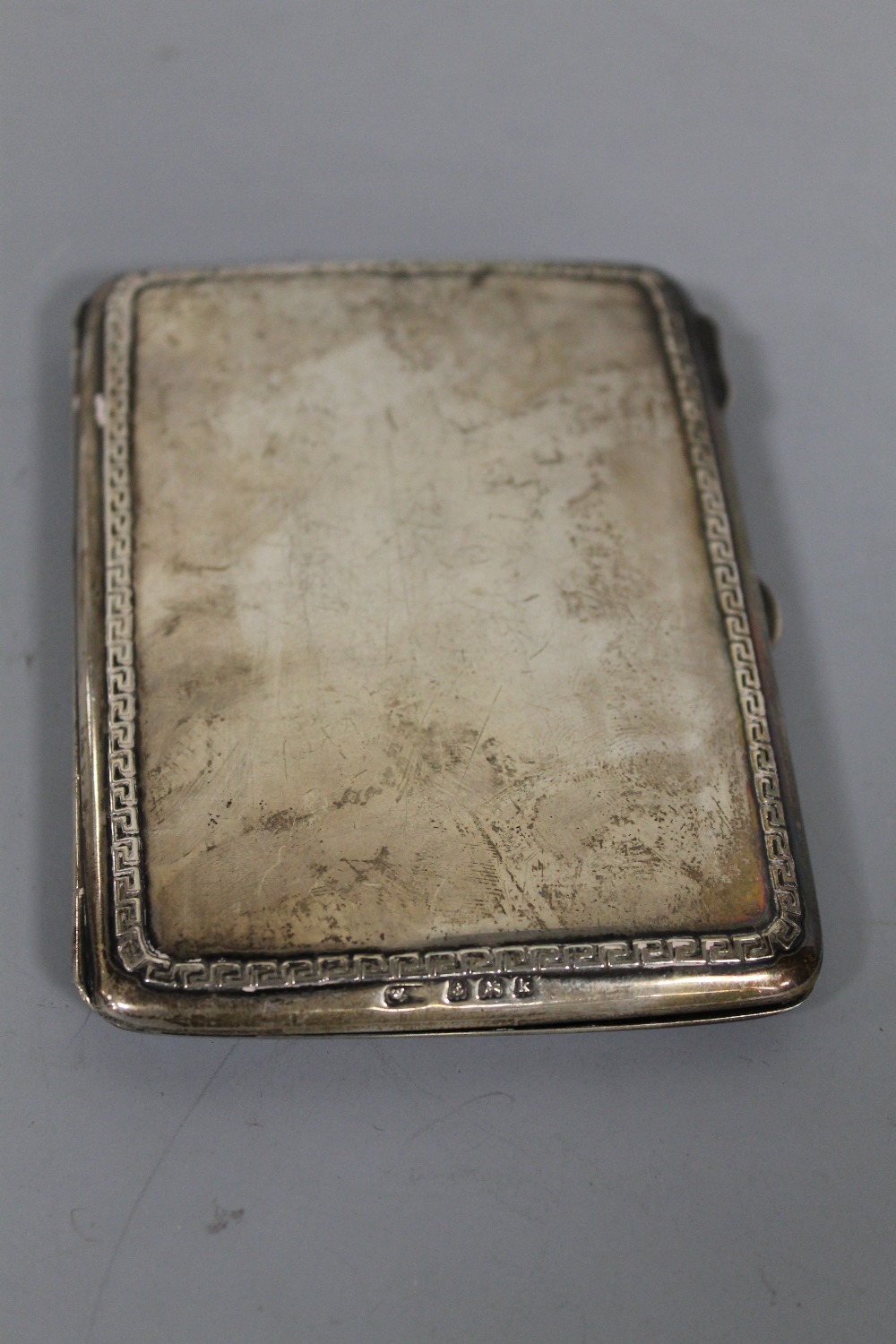 A HALLMARKED SILVER CALLING CARD CASE, hallmarked Birmingham 1909, with fitted leather interior