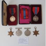 TWO CASED IMPERIAL SERVICE MEDALS, a George VI type named 'James Reginald Bertie Lester' and a Queen