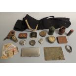 A TRAY OF MAINLY MILITARY INTEREST COLLECTABLES, to include tins, banknotes, wrist watch etc. Buyers