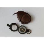 A MILITARY VERNIERS PATTERN POCKET COMPASS, in the original leather stitched case Buyers - for