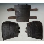 A REPRODUCTION 17TH CENTURY STYLE PIKEMAN'S TASSETS, made from pressed metal, with faux plates and