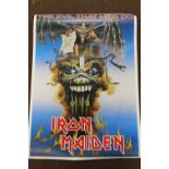 AN IRON MAIDEN 'THE EVIL THAT MEN DO' POSTER, A/F Buyers - for shipping pricing on this lot, visit