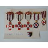 A COLLECTION OF ENAMEL MEDALS AND BADGES OF RED CROSS INTEREST, most named to 'I. England', to