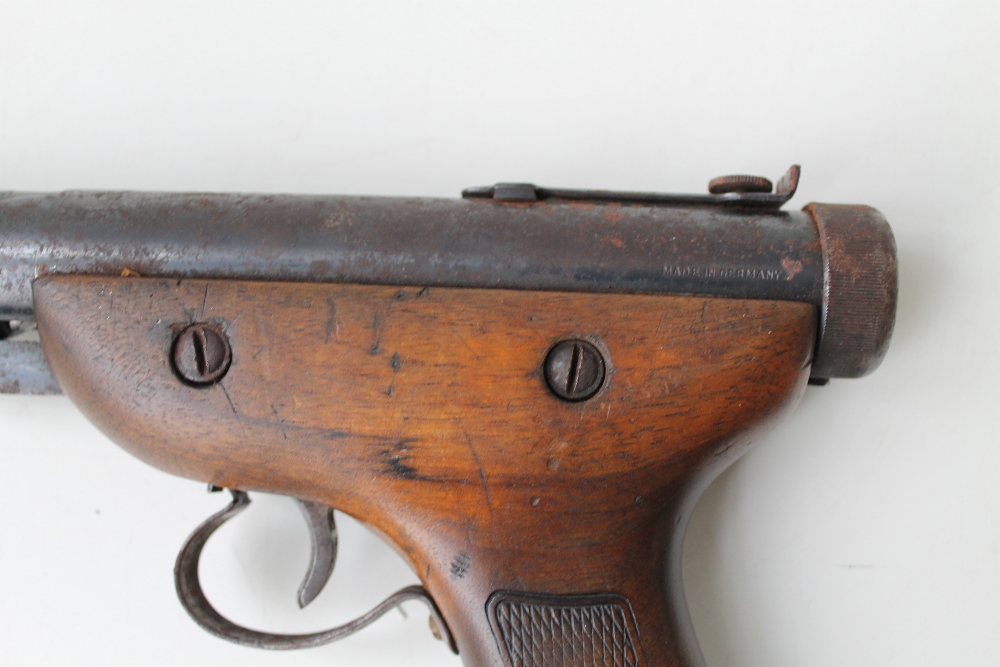 A 'DIANA' GERMAN MADE 177. AIR PISTOL, with wooden grip, L 3.5 cm Buyers - for shipping pricing on