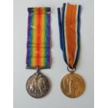 A WWI BWM AND VICTORY MEDAL PAIR, named to '65063 Pte J. Dicken Devon R' Buyers - for shipping