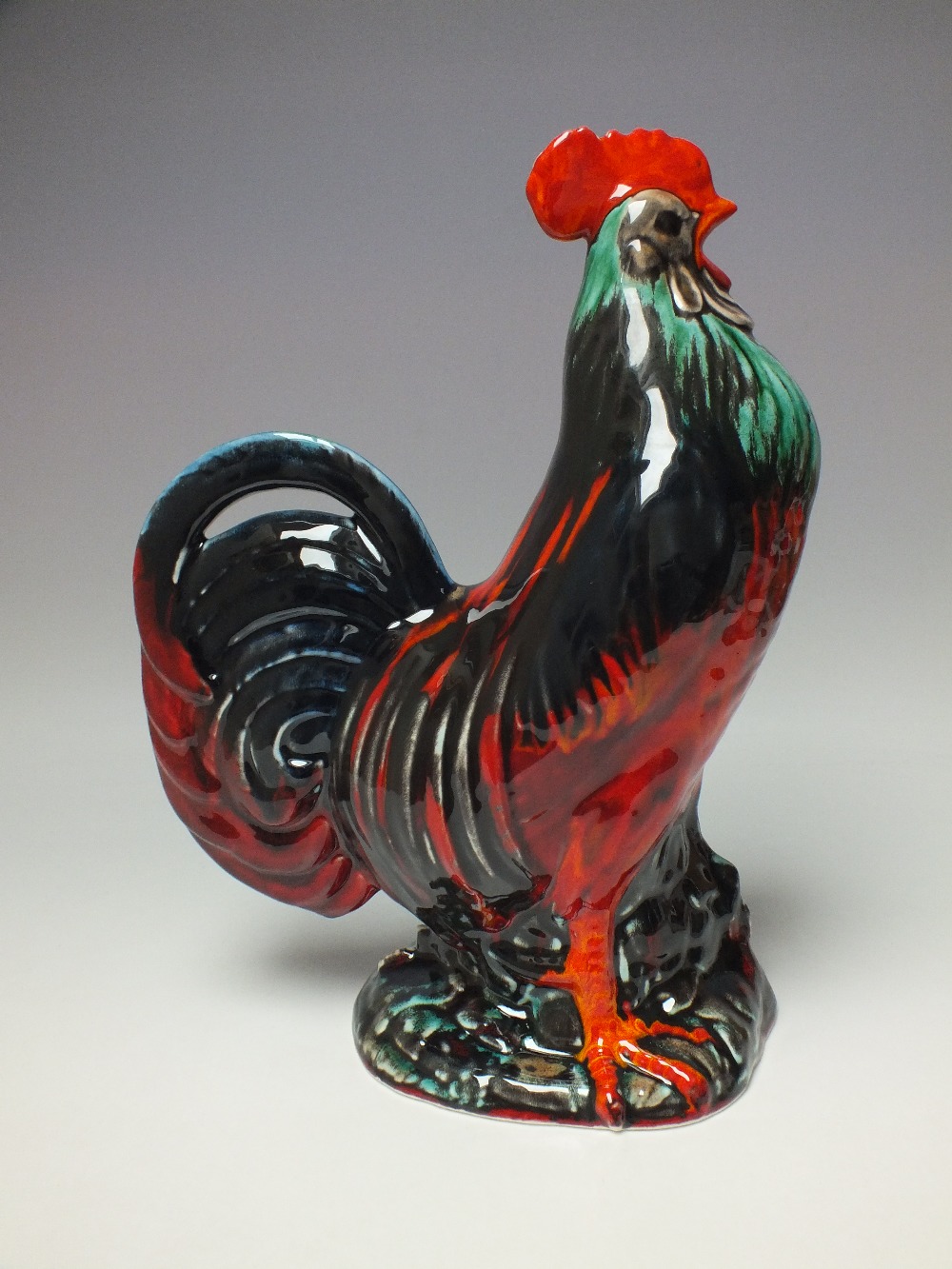 ANITA HARRIS STUDIO POTTERY LARGE COCKEREL FIGURE, painted with red, orange, blue and green