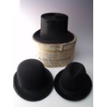 A BOXED 'DUNN & Co' BLACK SILK TOP HAT, together with a vintage bowler hat, and an Austrian style