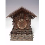 A LATE 19TH CENTURY TWIN FUSEE CUCKOO CLOCK ATTRIBUTED TO JOHANN BAPTISTE BEHA, the chalet style