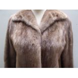 A LADIES VINTAGE PASTEL MINK SHORT JACKET, fully lined with embroidered initials, hook fastening,