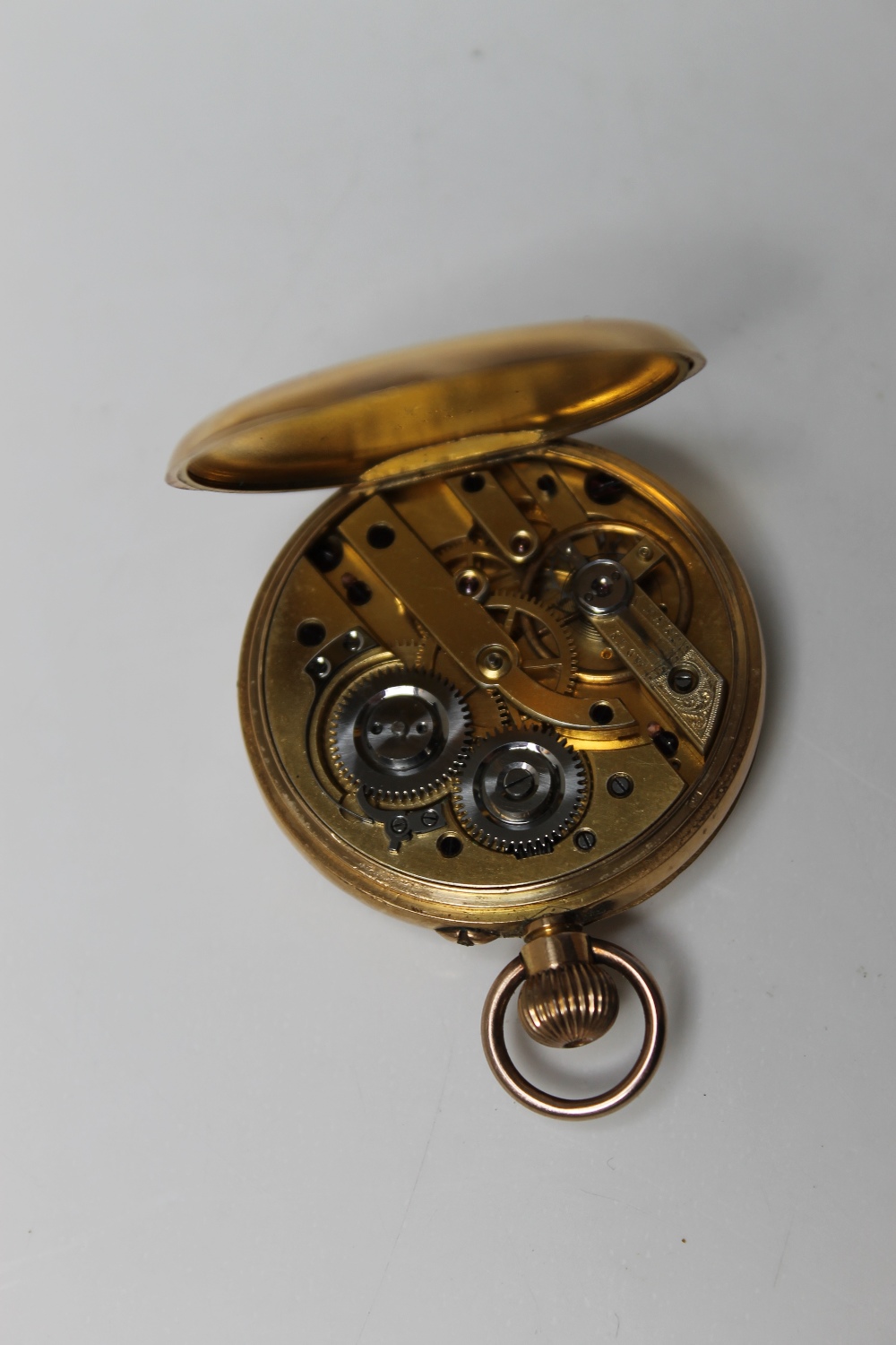 AN 18K GOLD OPEN FACED MANUAL WIND POCKET WATCH, having white enamel dial, Roman numeral hour - Image 2 of 2