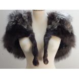 A VINTAGE FOX FUR SHRUG, fully lined, hook fastener to front edge Buyers - for shipping pricing on